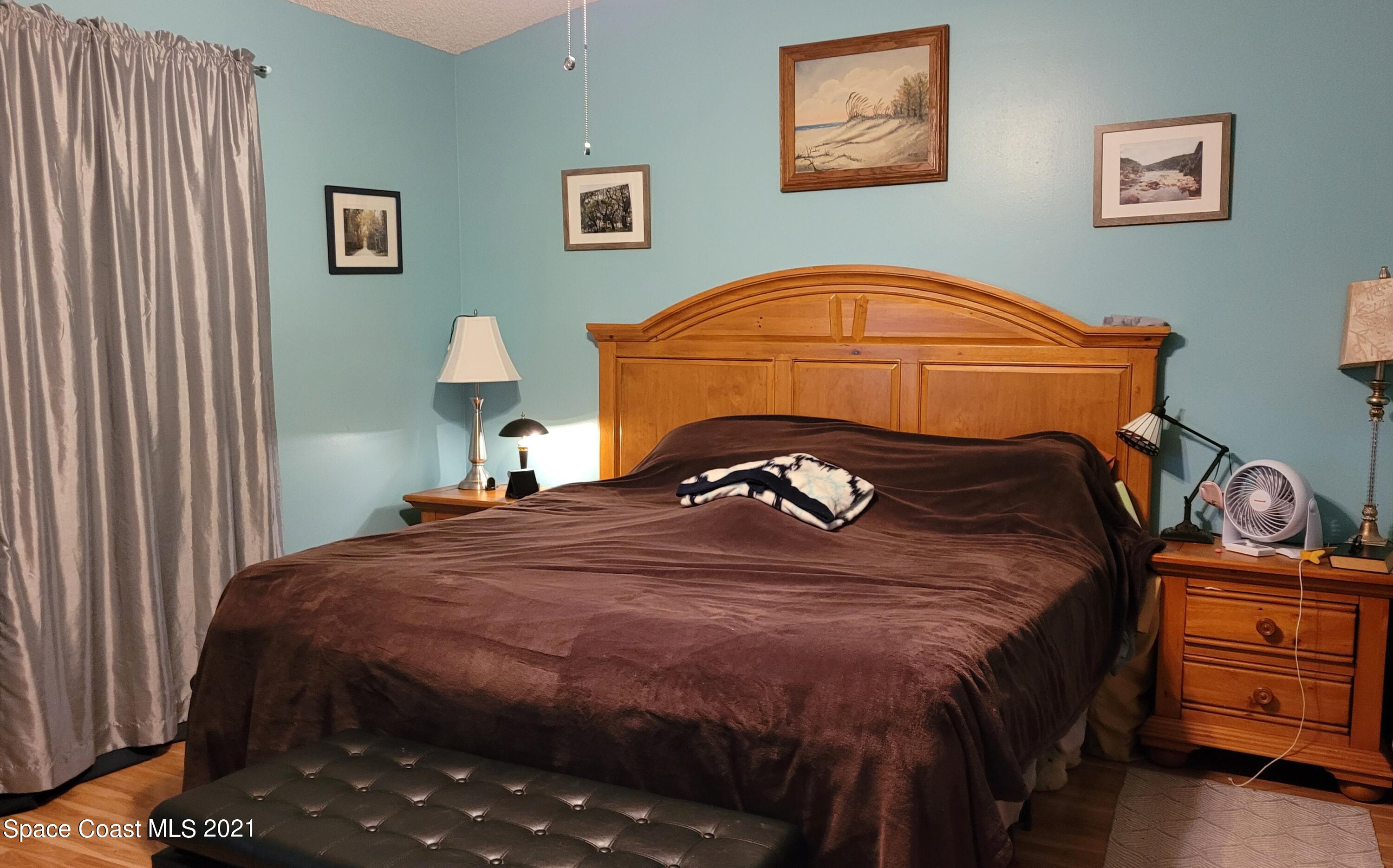 1050 Meadowbrook Road Northeast Palm Bay, FL 32905 - Photo 12 of 16 master Bedroom