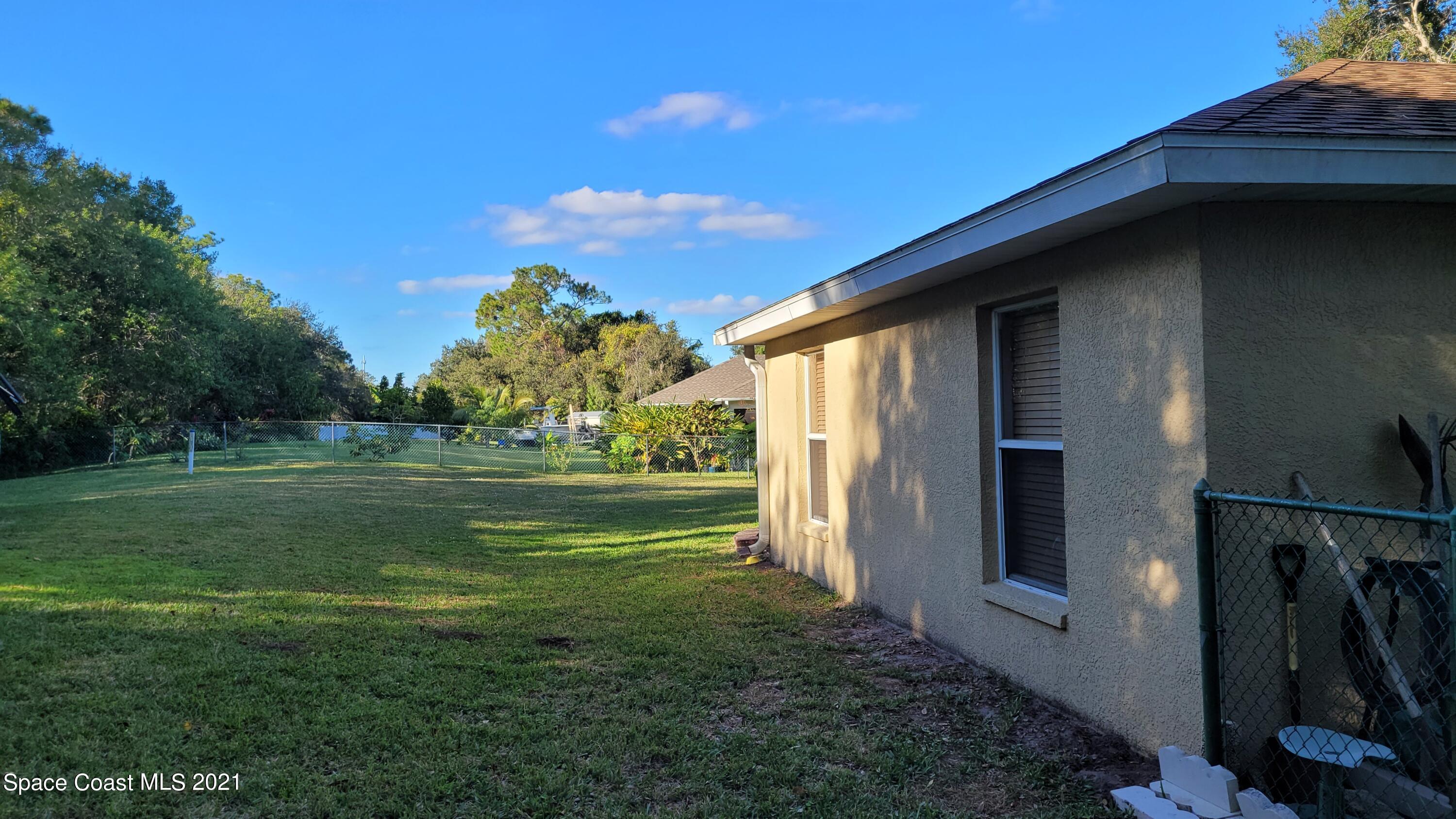 1050 Meadowbrook Road Northeast Palm Bay, FL 32905 - Photo 16 of 16 Large backyard