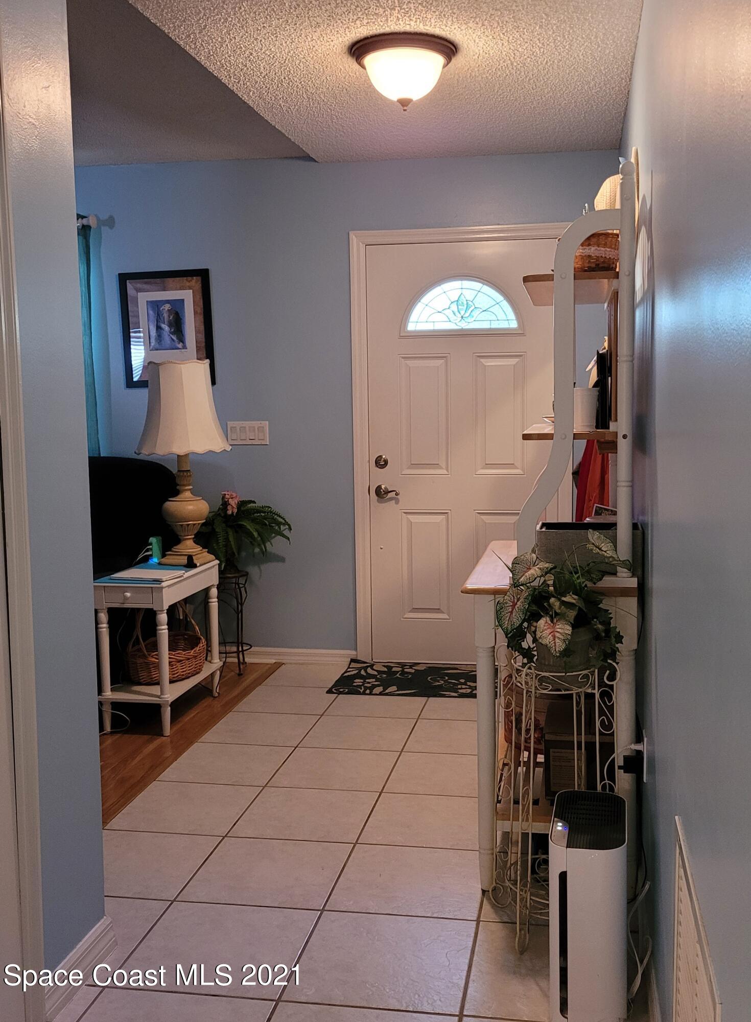 1050 Meadowbrook Road Northeast Palm Bay, FL 32905 - Photo 5 of 16 Hallway