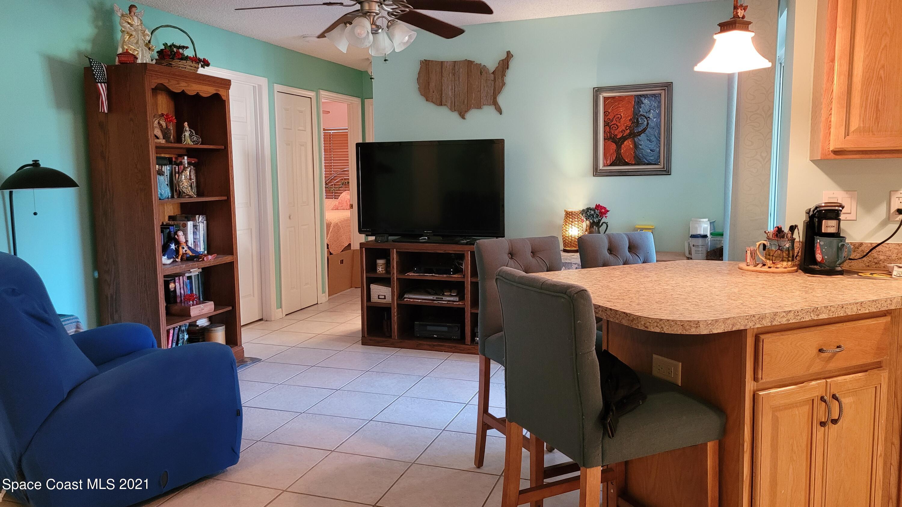 1050 Meadowbrook Road Northeast Palm Bay, FL 32905 - Photo 6 of 16 Den