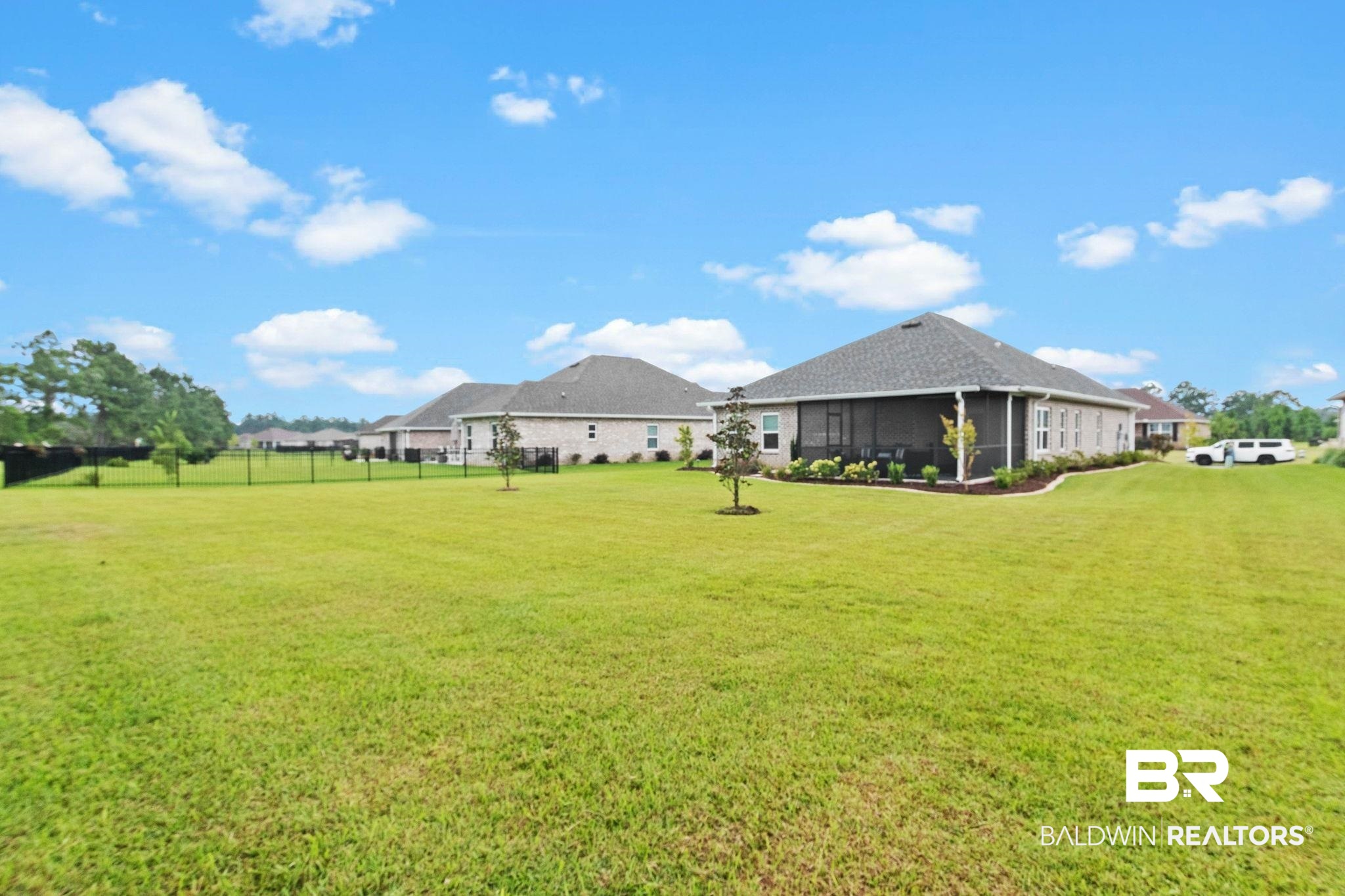 9815 Lakeview Drive Foley, AL 36535 - Photo 72 of 100 View of yard featuring a sunroom