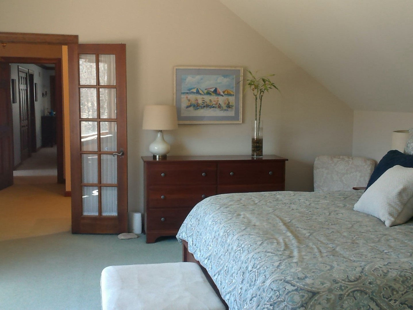 1201 Turicum Road Lake Forest, IL 60045 - Photo 12 of 20 a bedroom with a large bed and paintings on dresser