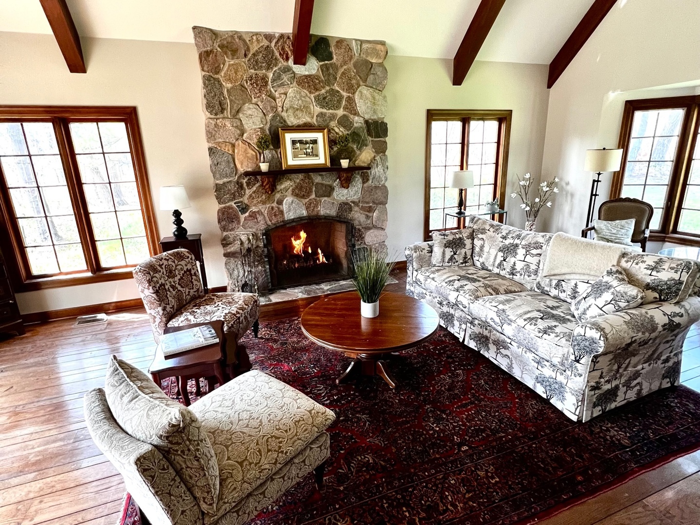 1201 Turicum Road Lake Forest, IL 60045 - Photo 4 of 20 a living room with furniture fireplace and a large window