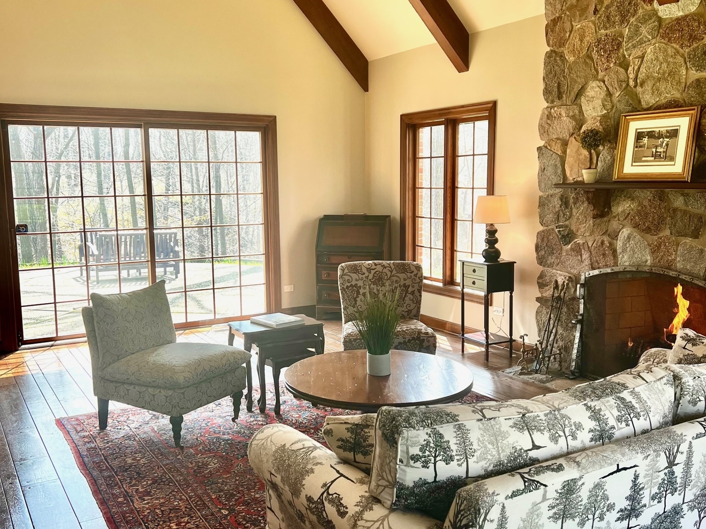 1201 Turicum Road Lake Forest, IL 60045 - Photo 5 of 20 a living room with fireplace furniture and a floor to ceiling window