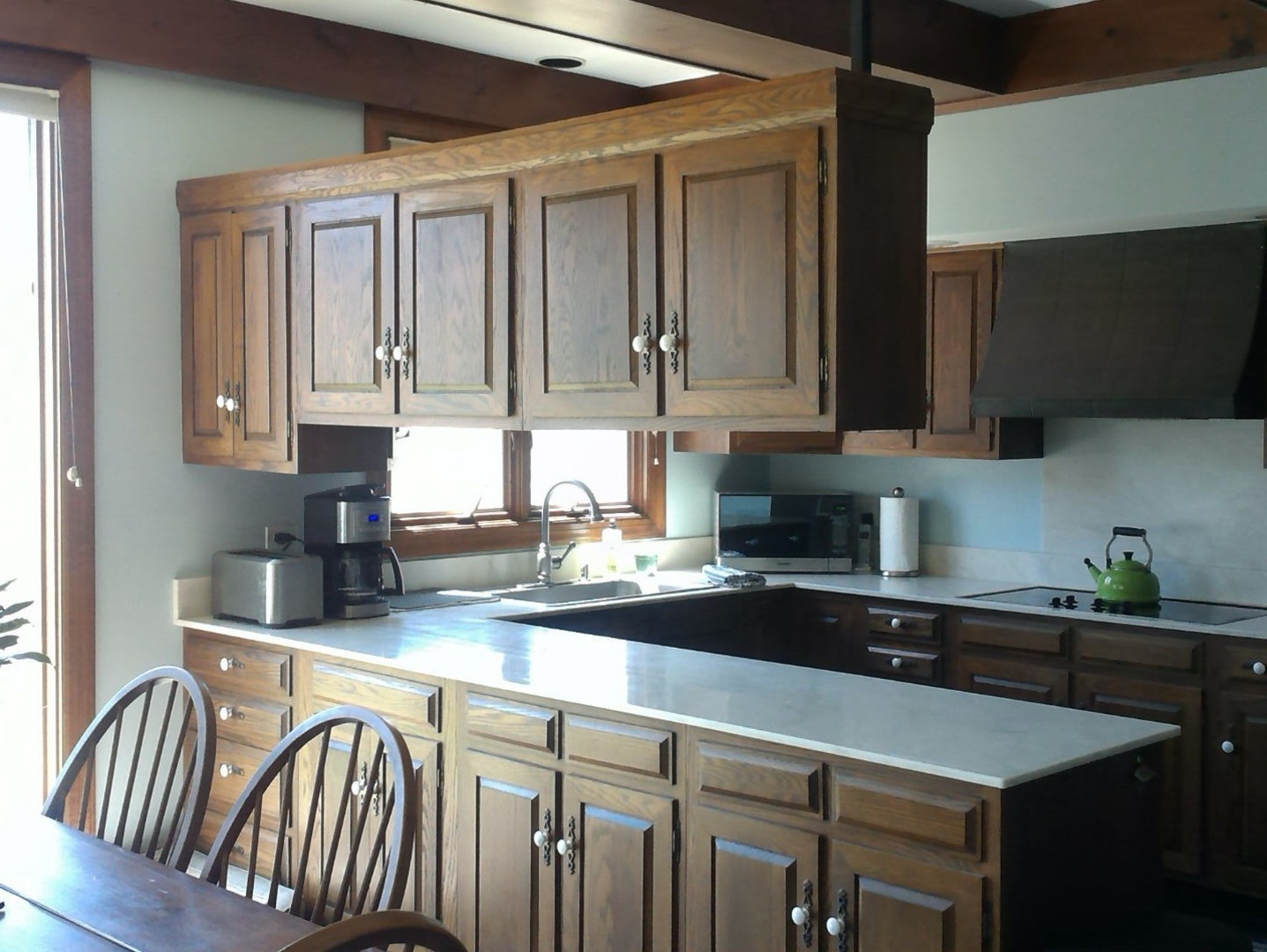 1201 Turicum Road Lake Forest, IL 60045 - Photo 9 of 20 a kitchen with stainless steel appliances granite countertop a sink a stove top oven a counter space and cabinets