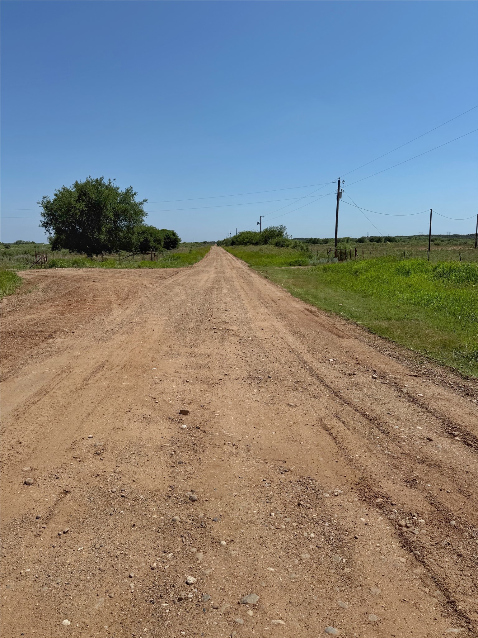 Nka Buckle L Road Childress, TX 79201 - Photo 8 of 12 Cleared dirt trail path cutting smoothly through native terrain, ideal for UTV transit or trail riding.