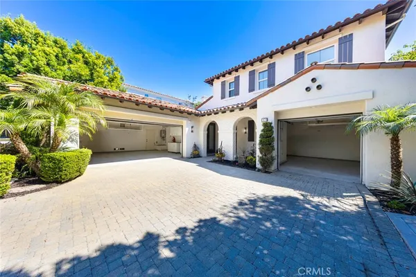 a front view of a house with a garage