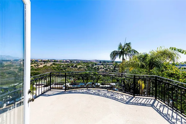 a view of a balcony with an ocean view