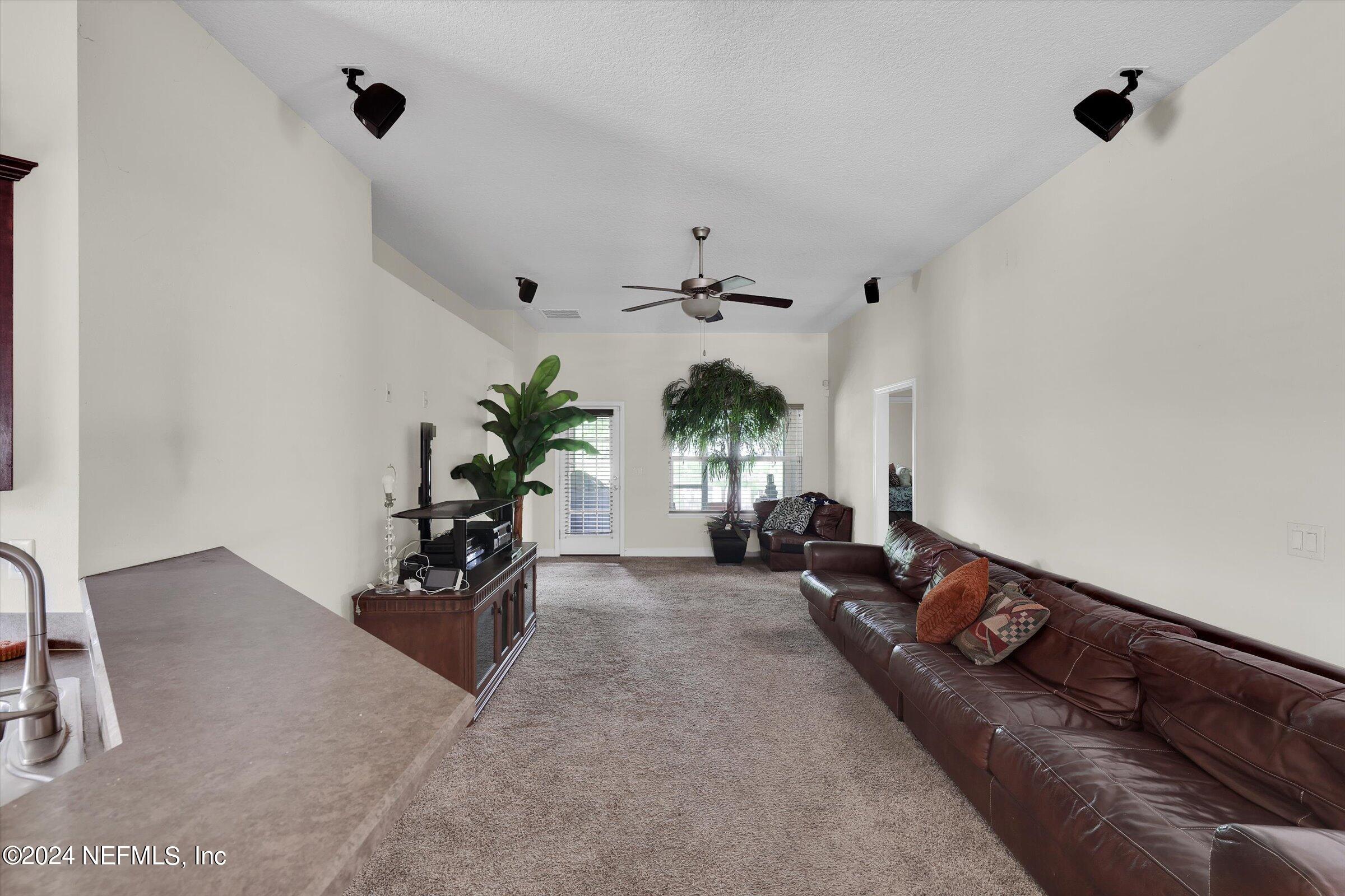 2109 Cherokee Cove Trail Jacksonville, FL 32221 - Photo 14 of 29 a living room with furniture
