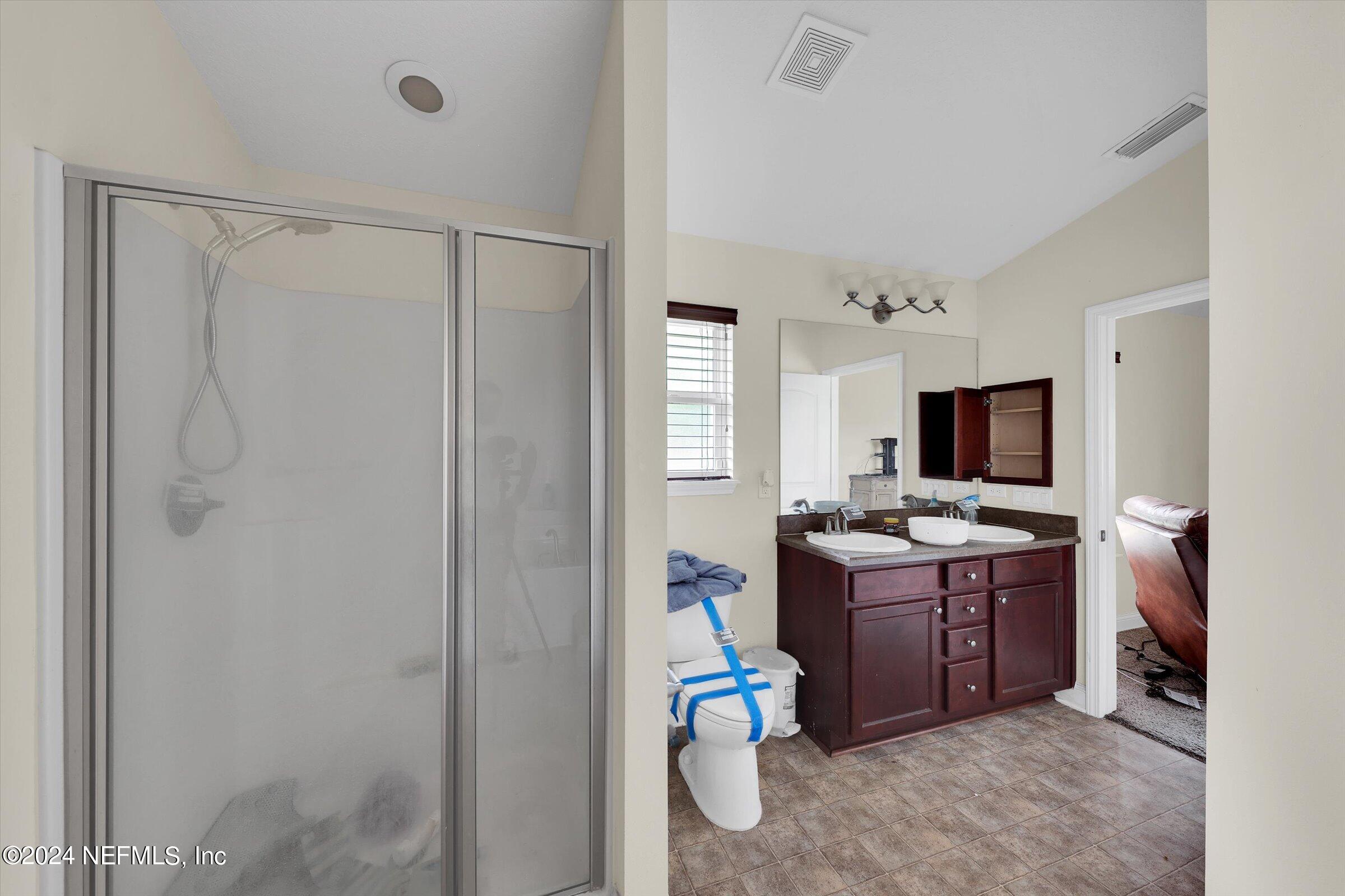 2109 Cherokee Cove Trail Jacksonville, FL 32221 - Photo 25 of 29 a view of a workspace with kitchen and a window