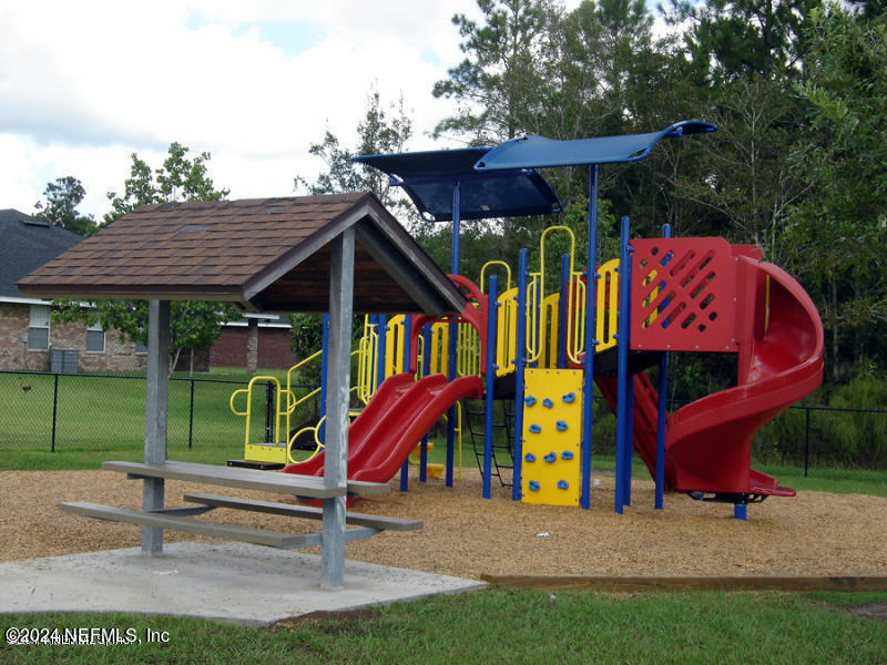 2109 Cherokee Cove Trail Jacksonville, FL 32221 - Photo 27 of 29 a view of a park with a slide