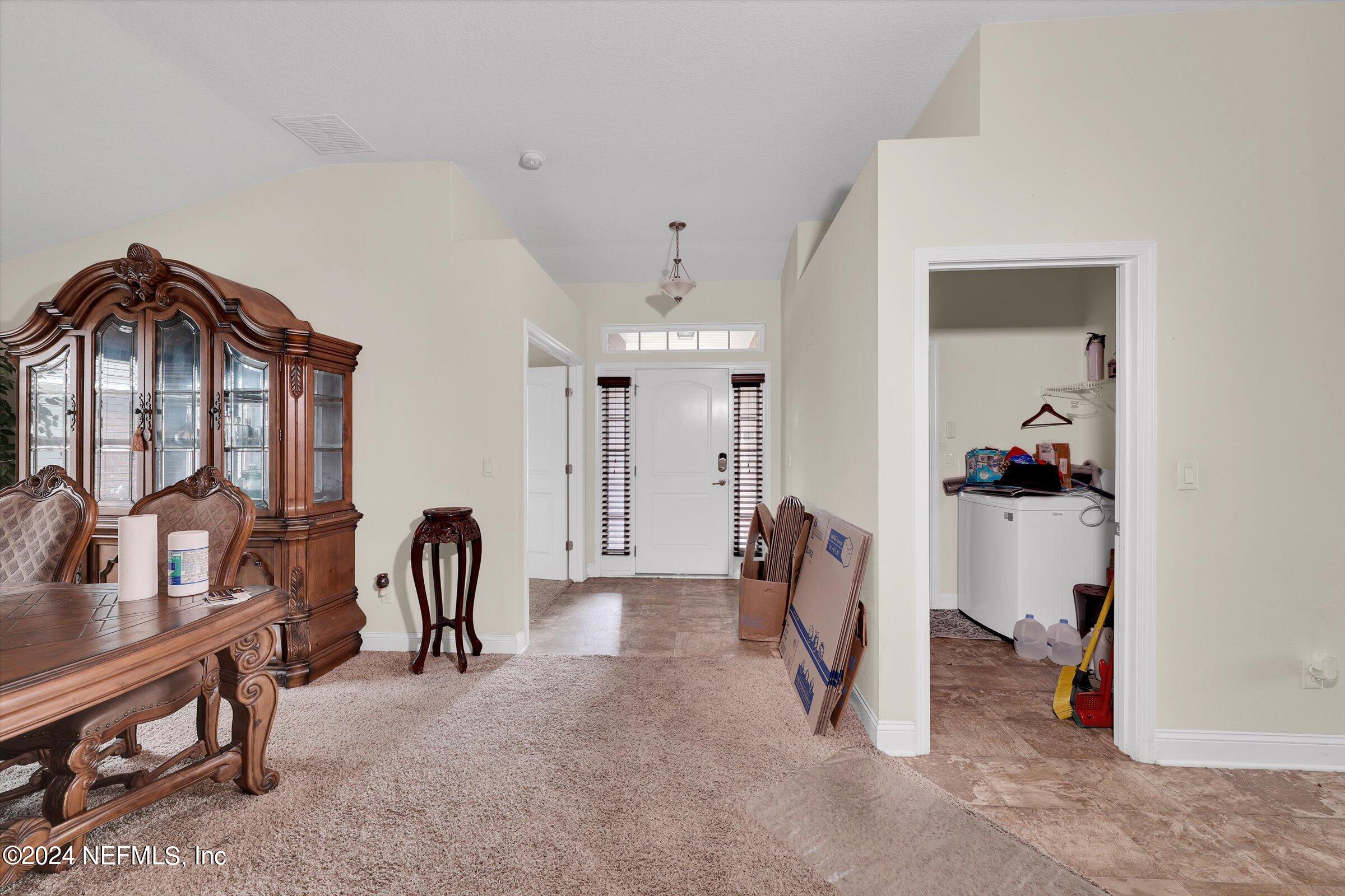 2109 Cherokee Cove Trail Jacksonville, FL 32221 - Photo 4 of 29 a view of a room with gym equipment