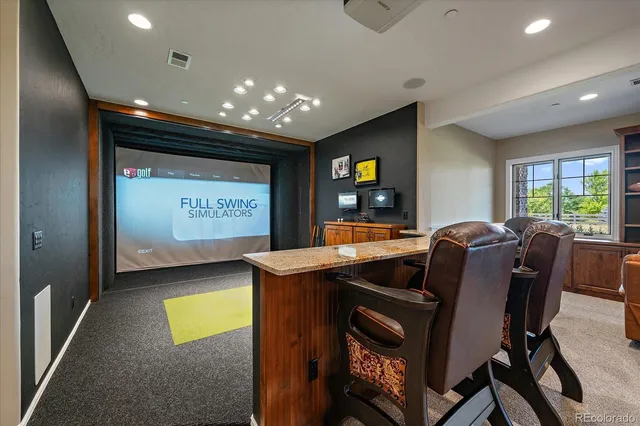 a view of a a dining room with furniture window and outside view