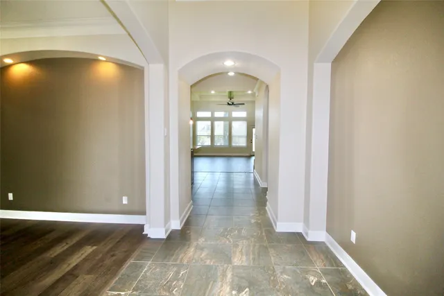 a view of a kitchen cabinets and a counter top space