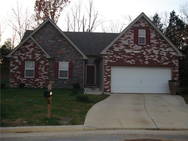2881 Evergreen Ridge Point Nashville, TN 37217 - Photo 1 of 18 a front view of a house with a yard