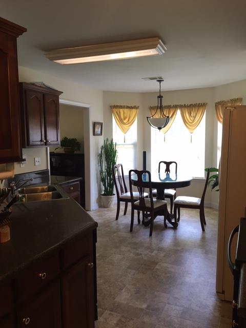 2881 Evergreen Ridge Point Nashville, TN 37217 - Photo 11 of 18 a view of a dining room with furniture window and outside view