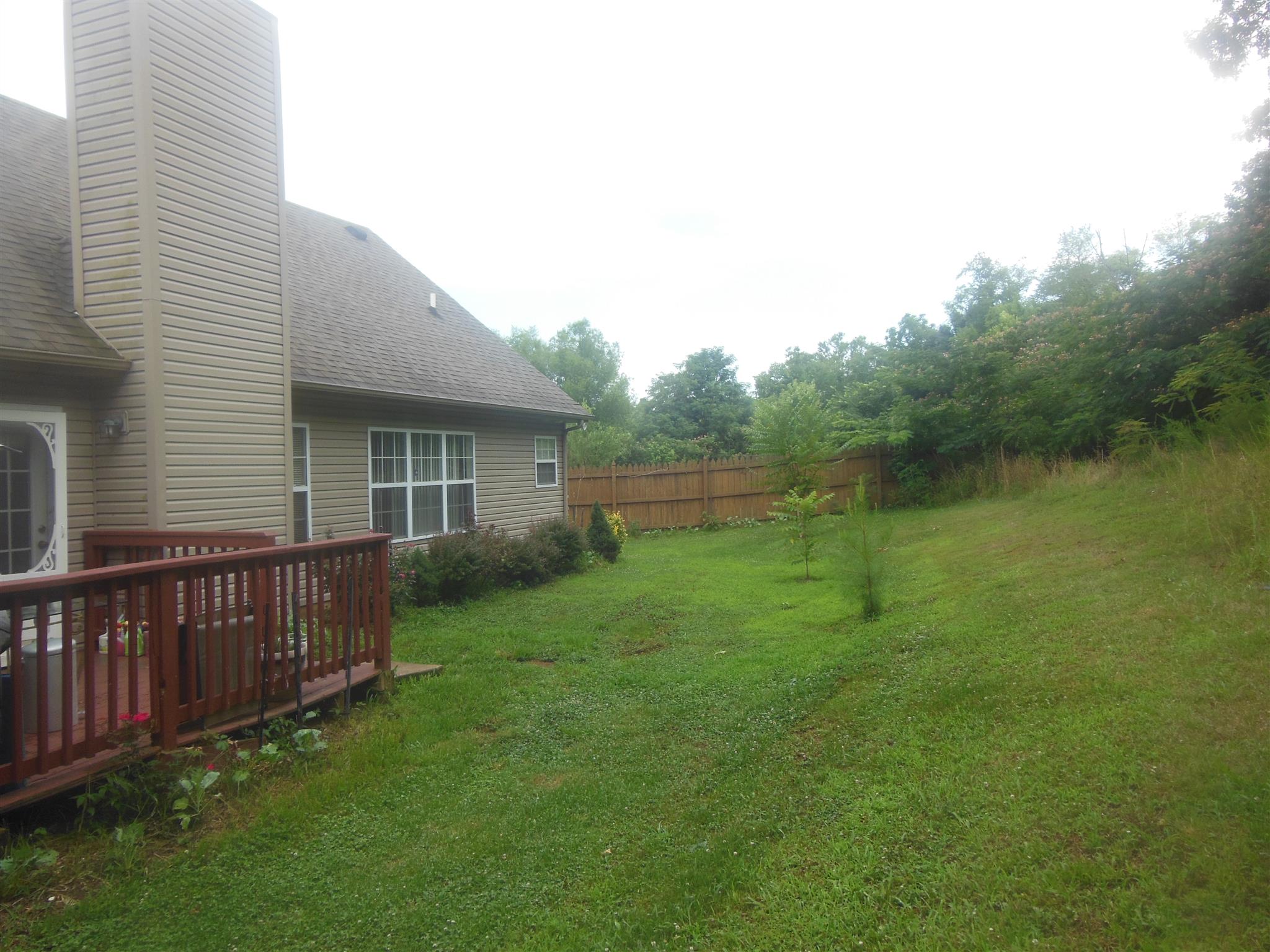 2881 Evergreen Ridge Point Nashville, TN 37217 - Photo 2 of 18 a view of a house with a backyard