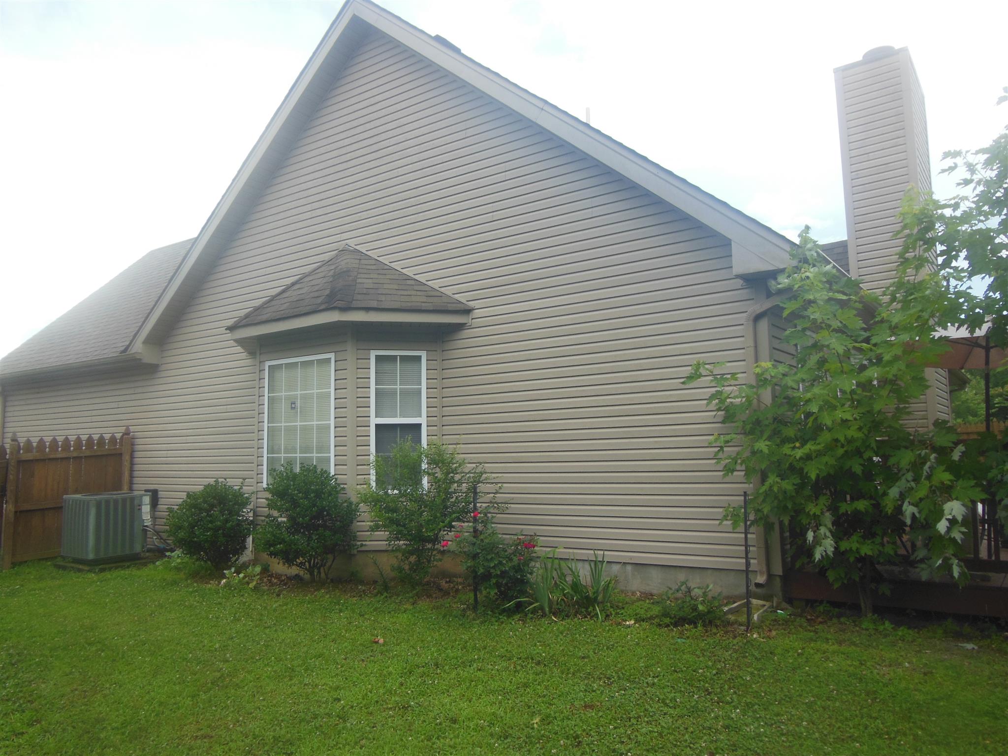 2881 Evergreen Ridge Point Nashville, TN 37217 - Photo 3 of 18 a view of a house with a backyard