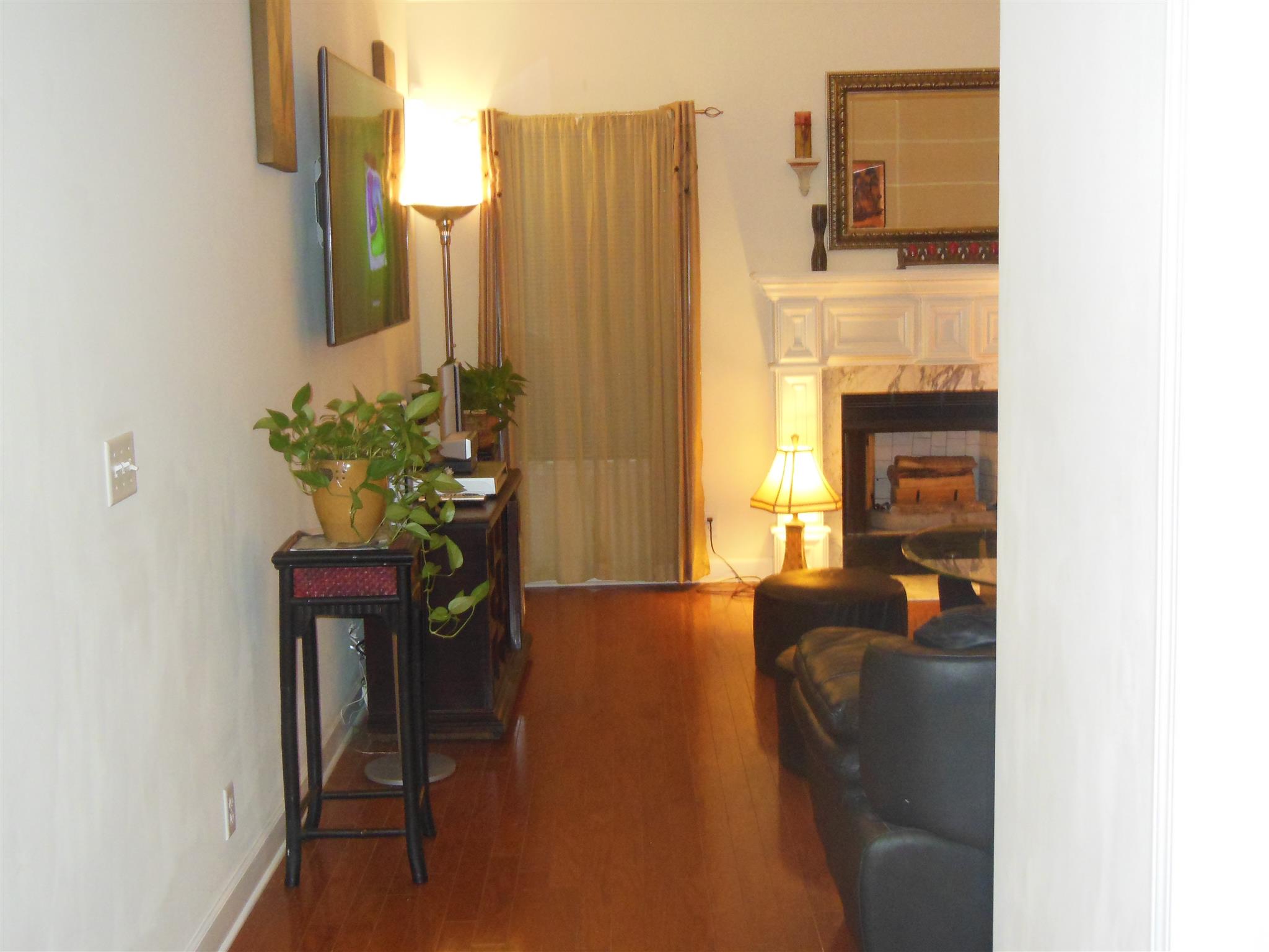 2881 Evergreen Ridge Point Nashville, TN 37217 - Photo 4 of 18 a living room with furniture and a fireplace