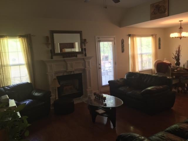 2881 Evergreen Ridge Point Nashville, TN 37217 - Photo 6 of 18 a living room with furniture and a fireplace