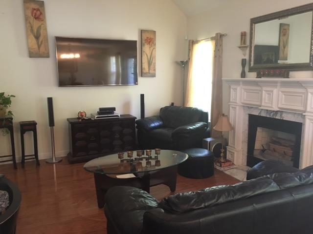 2881 Evergreen Ridge Point Nashville, TN 37217 - Photo 7 of 18 a living room with furniture and a fireplace