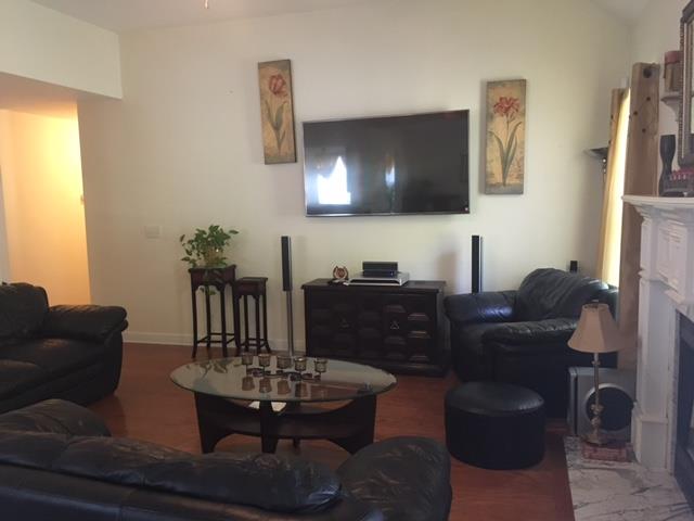 2881 Evergreen Ridge Point Nashville, TN 37217 - Photo 8 of 18 a living room with furniture and a chandelier