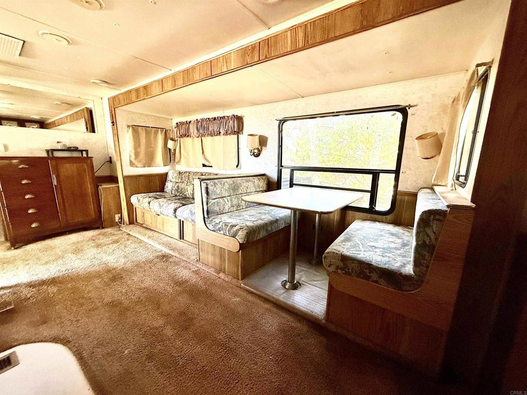 0 Olive Hill Road Fallbrook, CA 92028 - Photo 21 of 40 a living room with couch a rug and a window