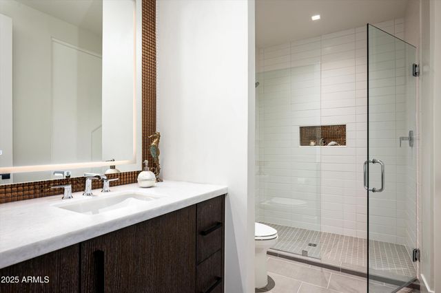 a outdoor living space with furniture and a potted plant