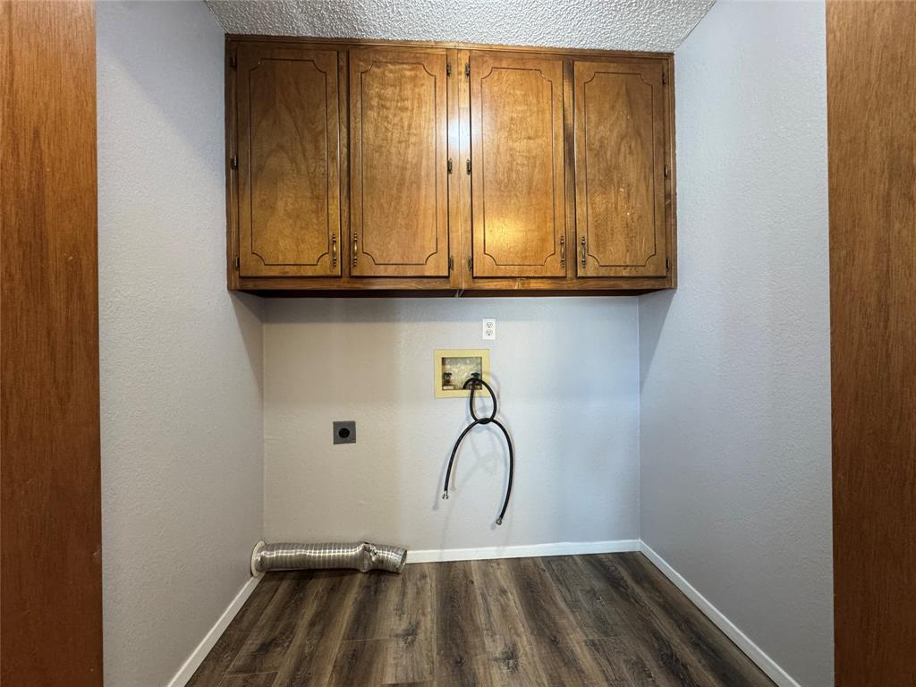 205 Wight Street Roxton, TX 75477 - Photo 8 of 22 a view of a room with wooden floor