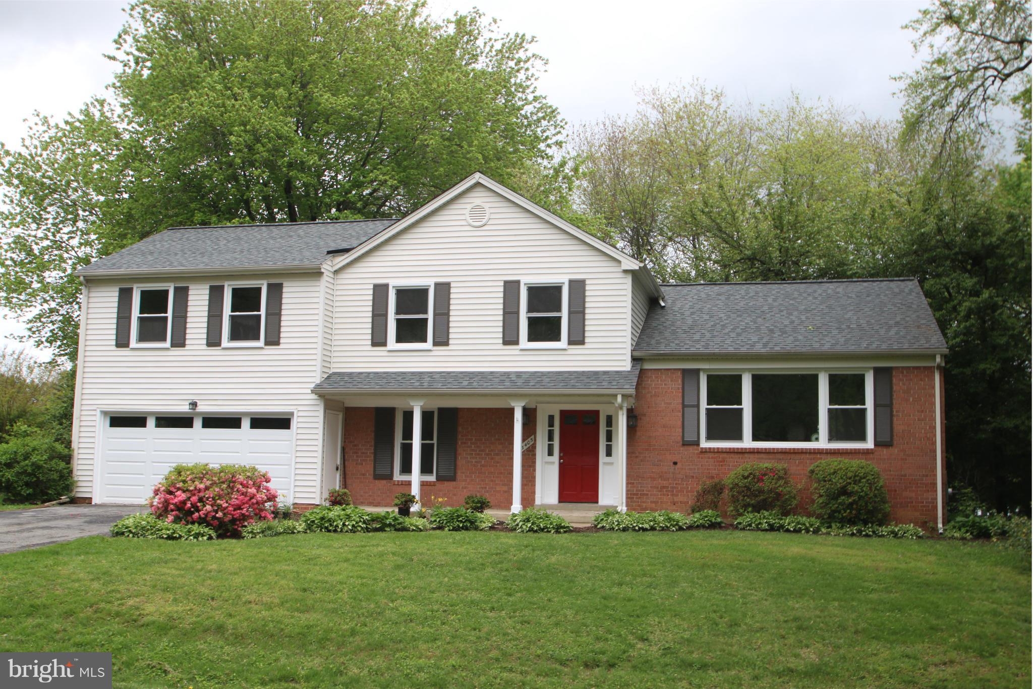 3405 Briars Road Brookeville, MD 20833 - Photo 1 of 21 a front view of a house with a garden
