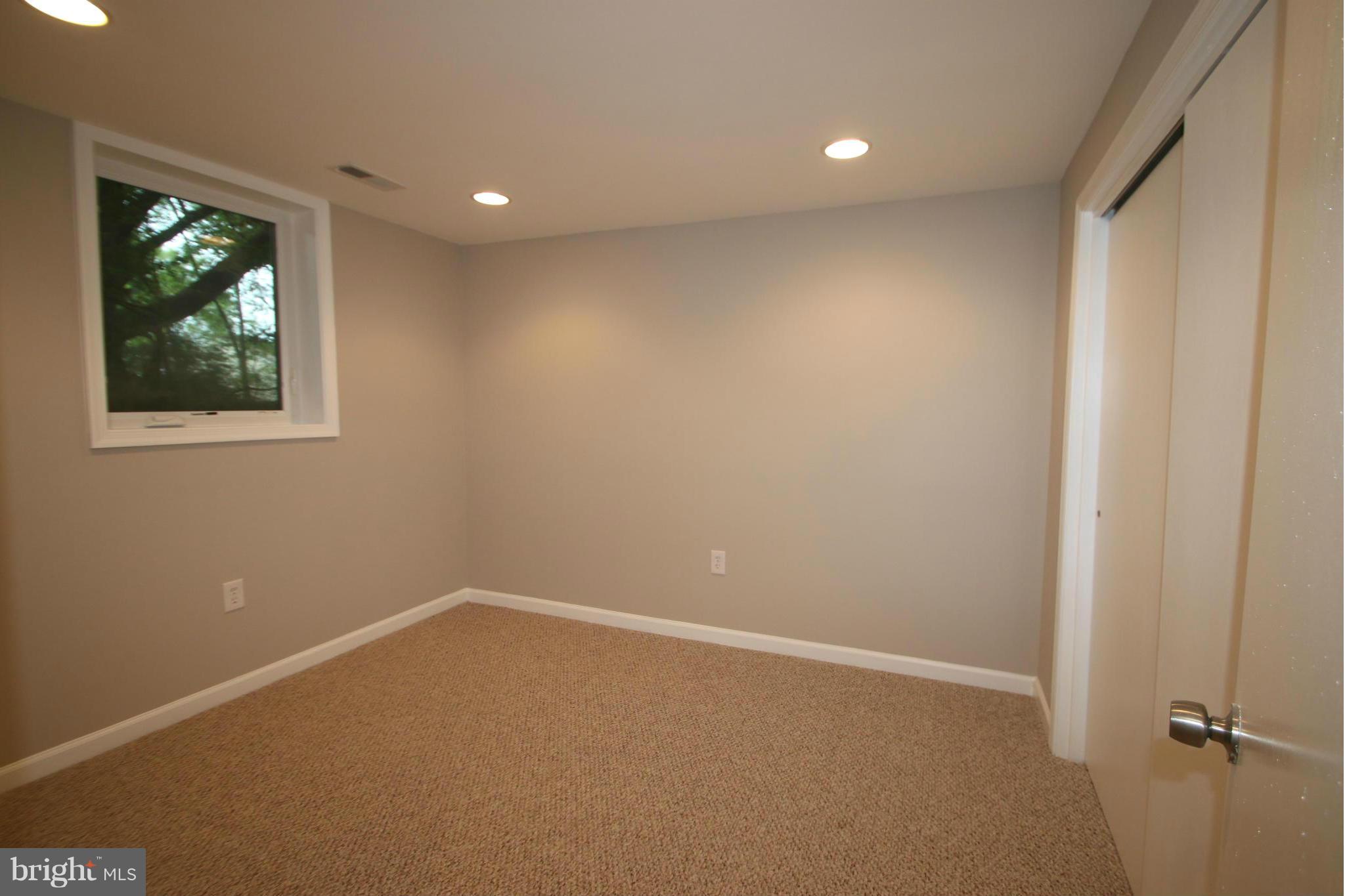 3405 Briars Road Brookeville, MD 20833 - Photo 17 of 21 a view of an empty room with a window
