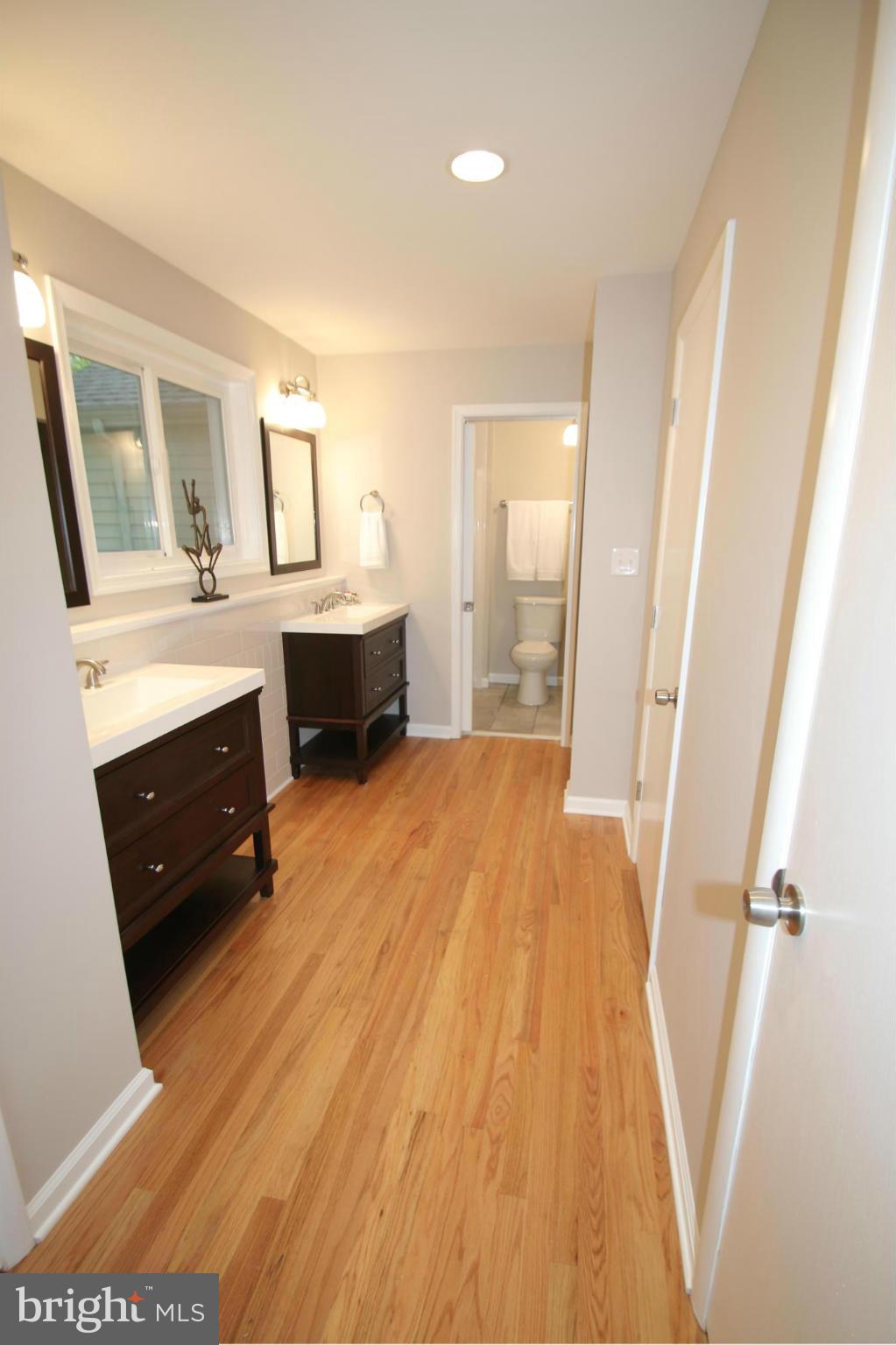 3405 Briars Road Brookeville, MD 20833 - Photo 8 of 21 a bathroom with a sink and a mirror