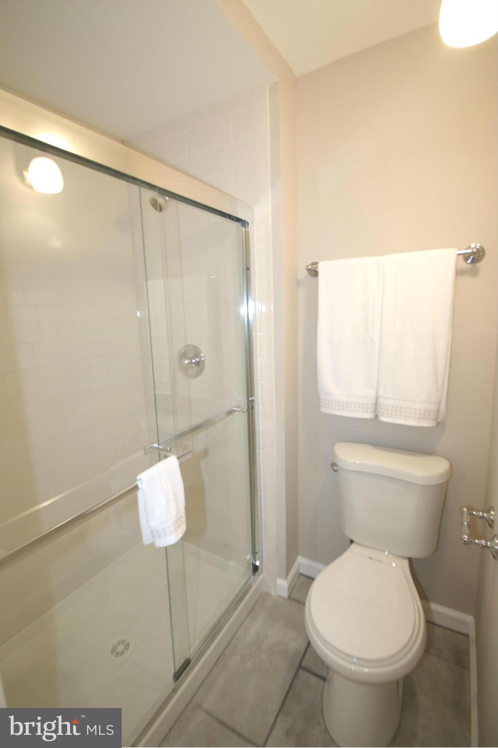 3405 Briars Road Brookeville, MD 20833 - Photo 10 of 21 a bathroom with a toilet and a shower