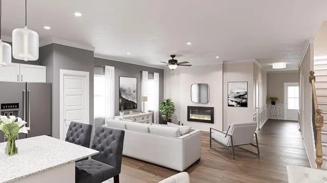 a living room with furniture fireplace and window