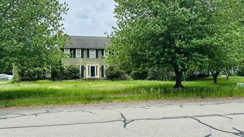 4 Canoe River Road Easton, MA 02375 - Photo 1 of 9 a front view of a house with a yard