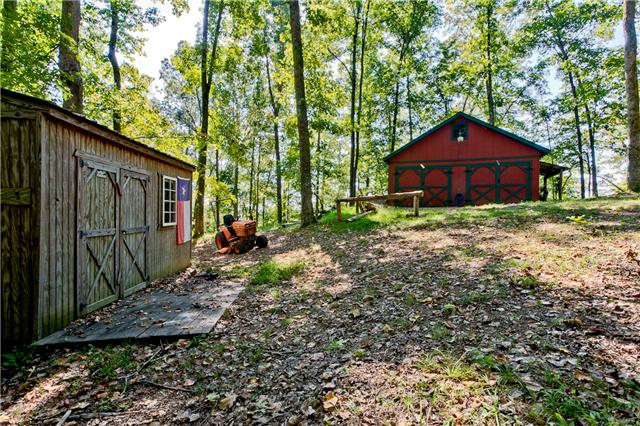 5247 Old Harding Road Fairview, TN 37062 - Photo 18 of 20 a backyard of a house with lots of green space