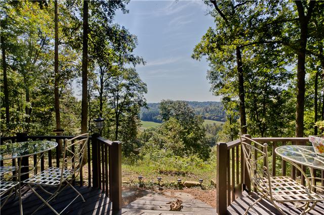 5247 Old Harding Road Fairview, TN 37062 - Photo 4 of 20 a view of balcony with wooden floor and fence