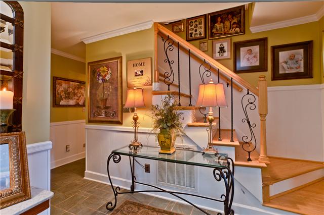 5247 Old Harding Road Fairview, TN 37062 - Photo 5 of 20 a view of staircase with furniture and windows