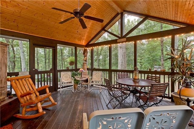 5247 Old Harding Road Fairview, TN 37062 - Photo 8 of 20 a living room with furniture and floor to ceiling windows