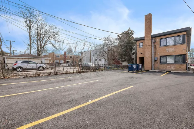 a view of a building with a road