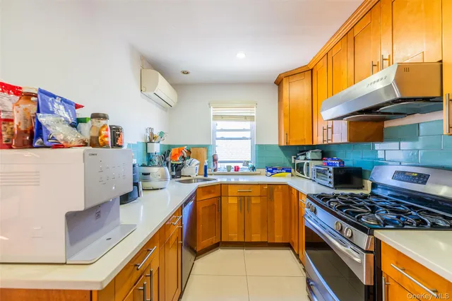 a bathroom with a sink a toilet and a shower