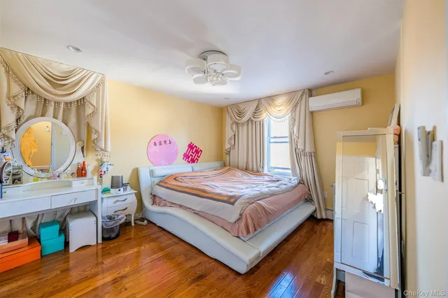 a view of hallway with wooden floor