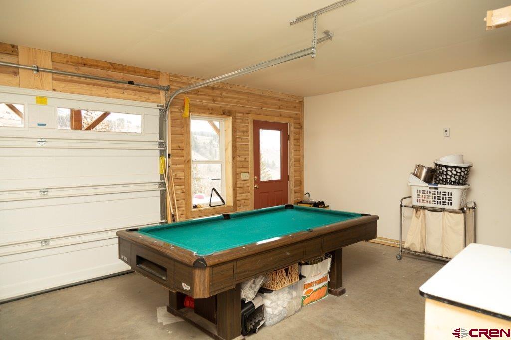 301 West 3rd Street Creede, CO 81130 - Photo 12 of 17 a room with pool table and windows