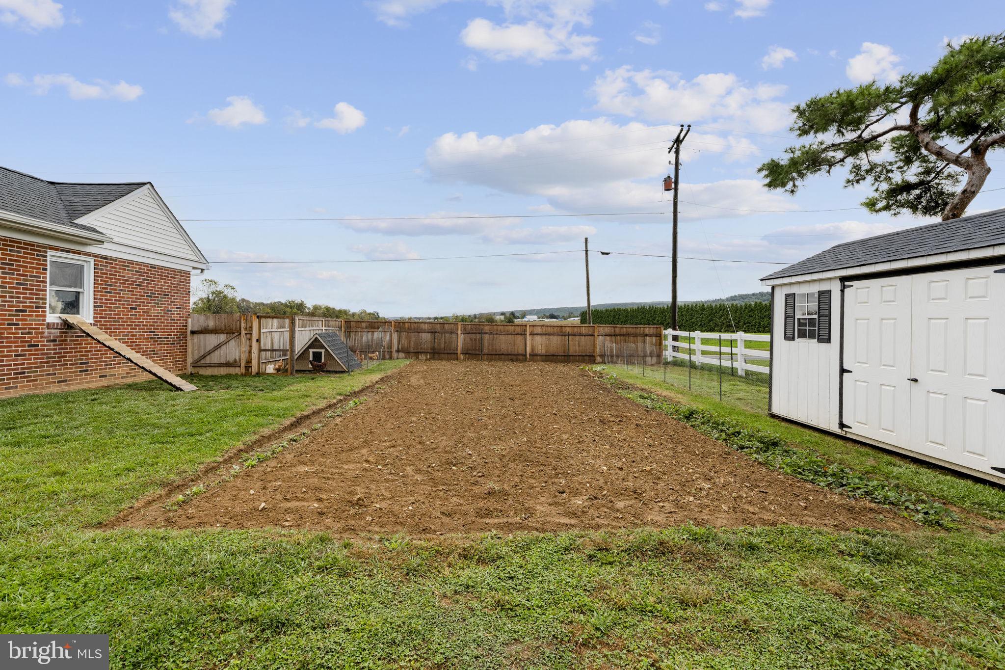210 Musser Road East Earl, PA 17519 - Photo 15 of 44 a view of a house with a yard