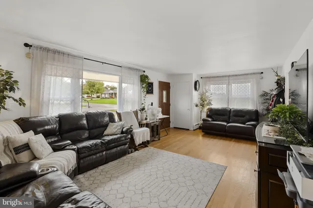 a living room with furniture and a couch