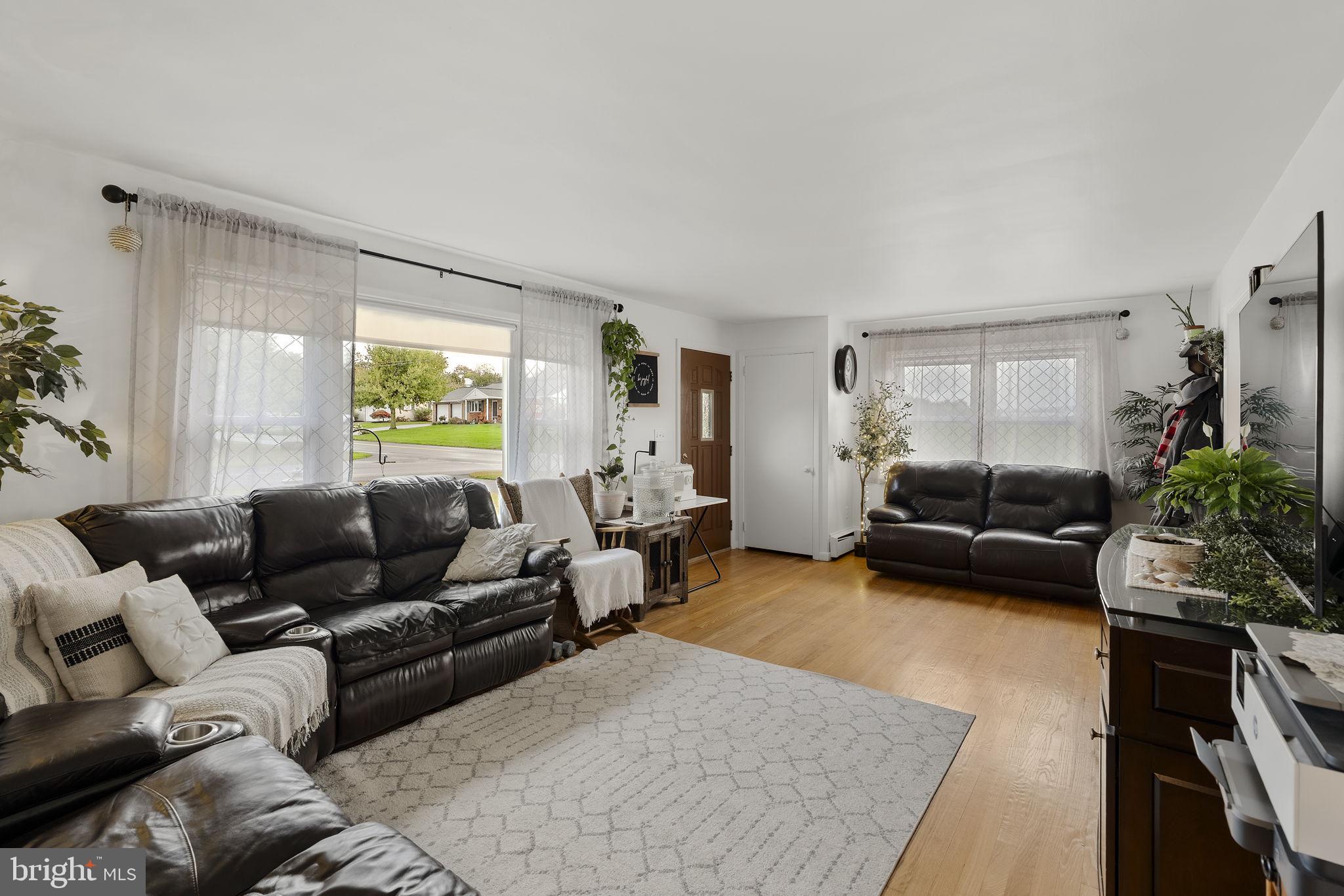 210 Musser Road East Earl, PA 17519 - Photo 18 of 44 a living room with furniture and a couch