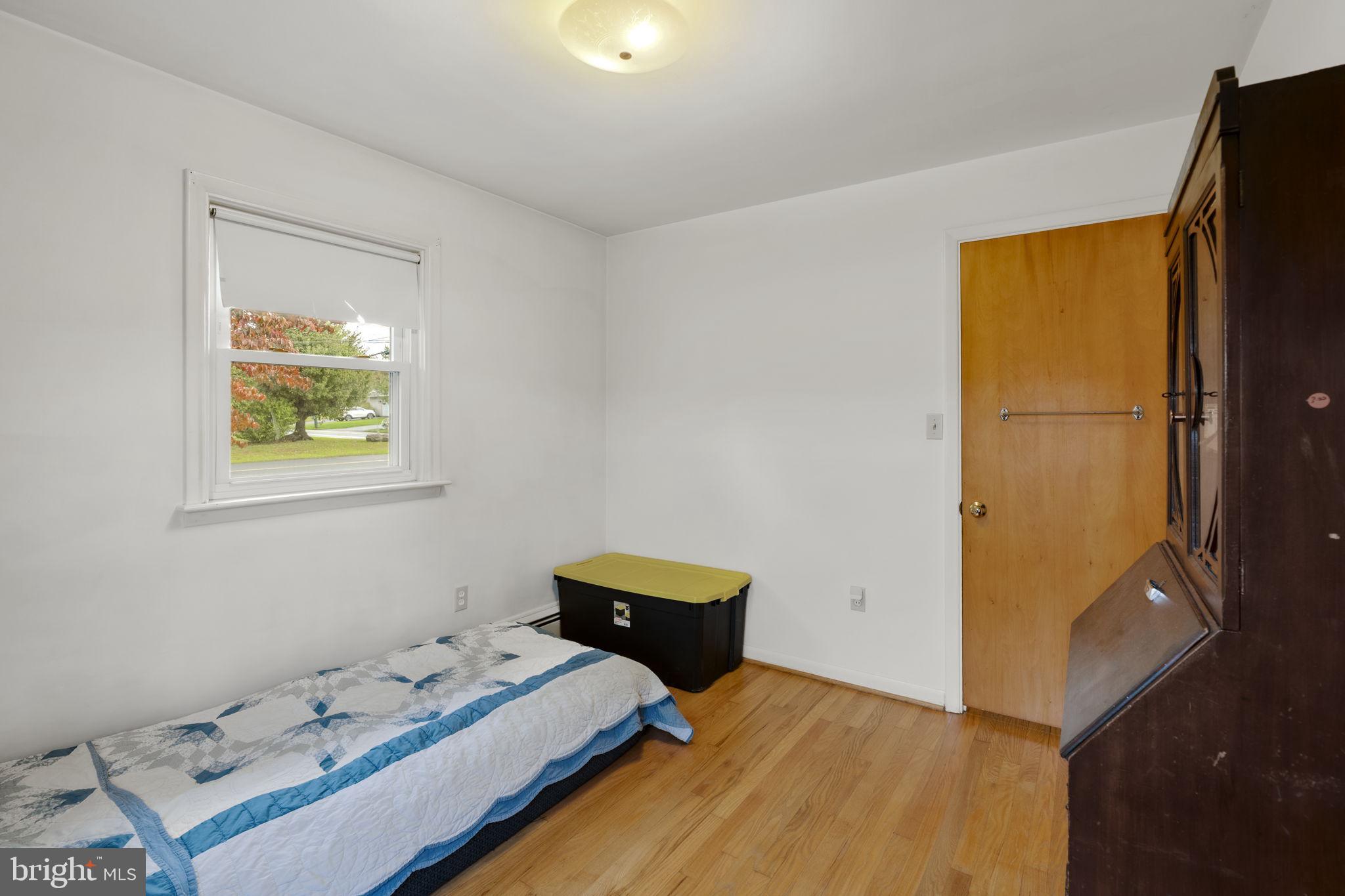 210 Musser Road East Earl, PA 17519 - Photo 27 of 44 a bedroom with a bed and a window