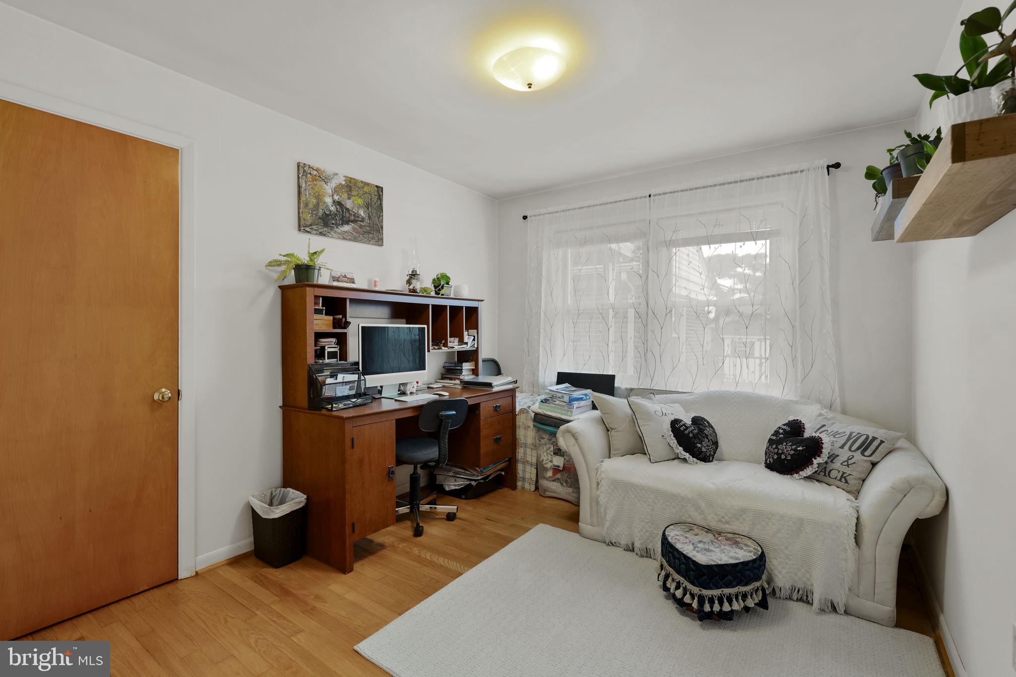 210 Musser Road East Earl, PA 17519 - Photo 28 of 44 a living room with furniture and a flat screen tv