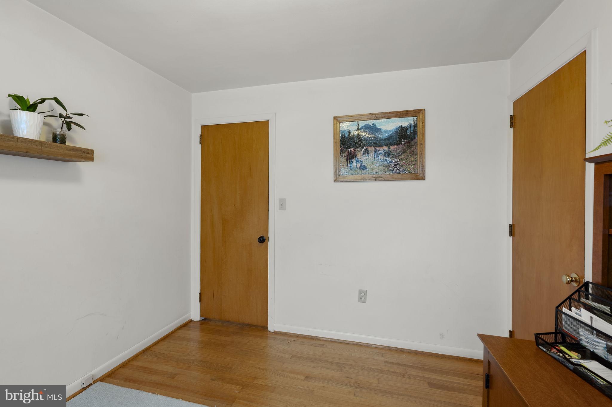210 Musser Road East Earl, PA 17519 - Photo 29 of 44 a view of an empty room with wooden floor and a window