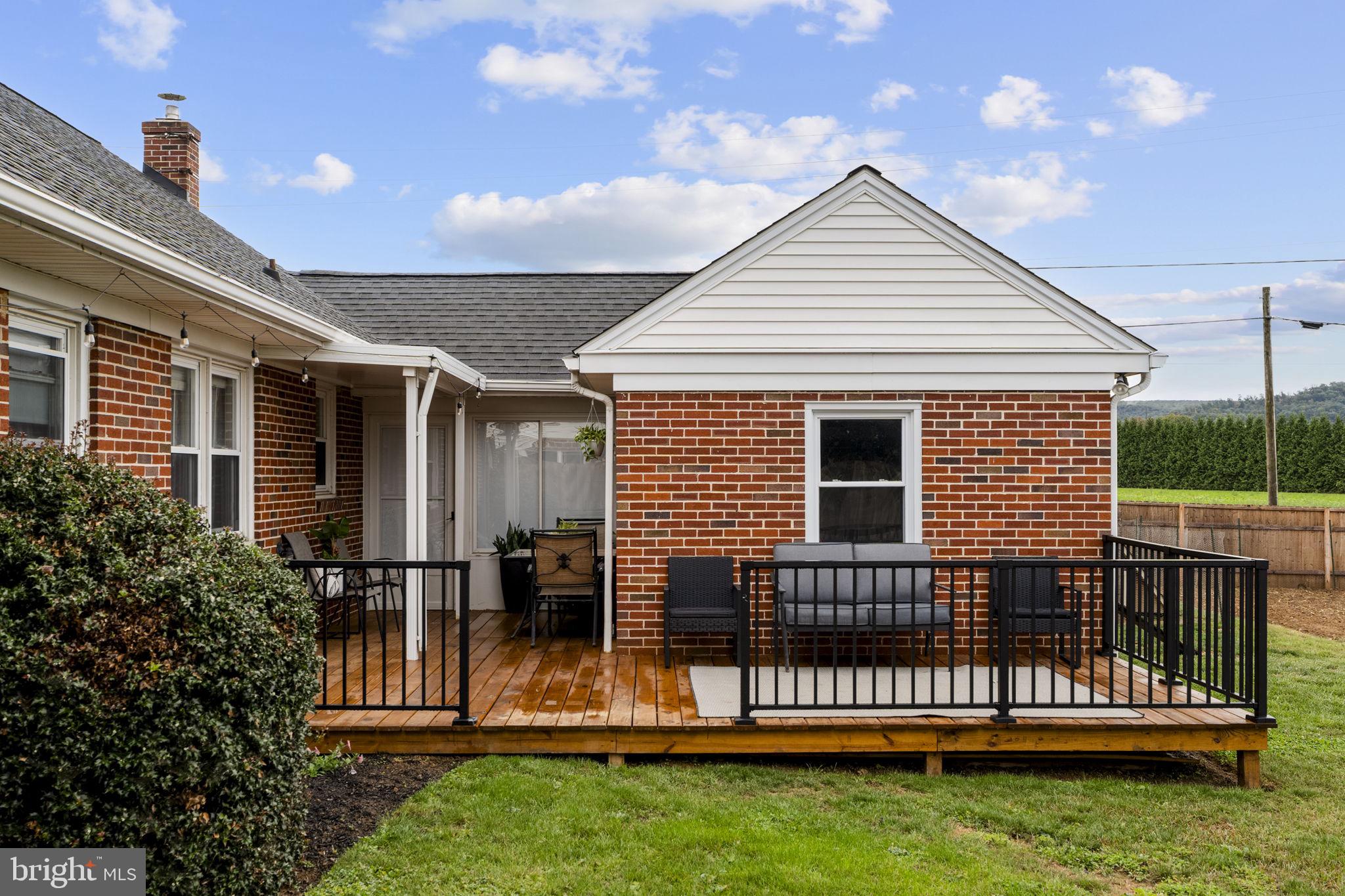 210 Musser Road East Earl, PA 17519 - Photo 9 of 44 a front view of a house with a garden